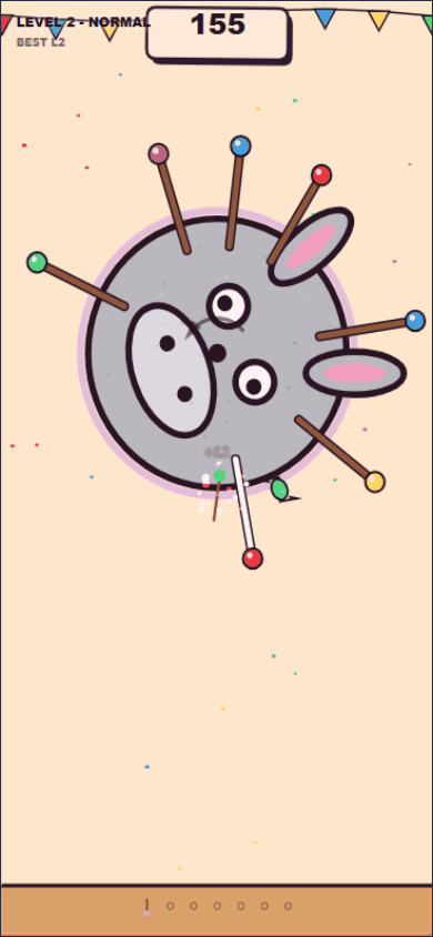 Pin The Tail in play: a tail in flight into a narrow gap on a donkey already full of tails
